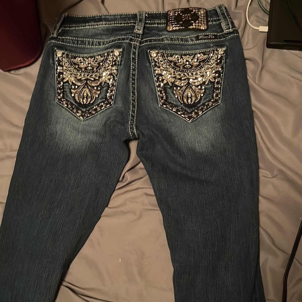 Barely worn. Can’t fit in them anymore